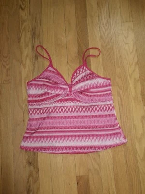 Camiseta sin mangas rosa y blanca Foto 1 de 2