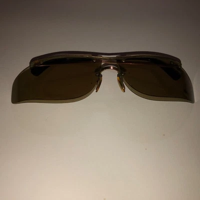 VENTA DE GAFAS DE SOL CURVAS DEPORTIVAS SIN MARCO DORADO 99 VINTAGE RARAS COOL RAY POLAROID Foto 1 de 4