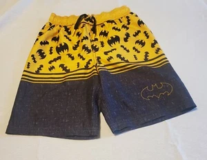 BATMAN Swim Trunks Boys  Medium (8) Mustard Yellow  Black Lined Pre-owned EUC  - Picture 1 of 10