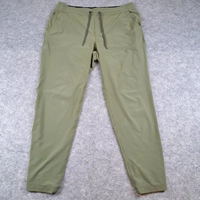 Pantalones cooperativos REI para mujer grandes verdes para correr senderismo elásticos al aire libre correr sendero Foto 1 de 4