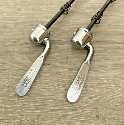 JUEGO DE PINCHOS DE LIBERACIÓN RÁPIDA SHIMANO 100-126 MM ACERO ESPACIADO Foto 1 de 4