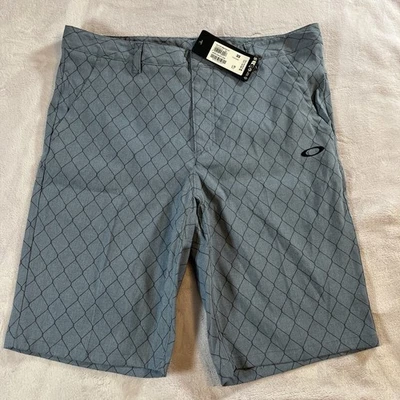 Pantalones Cortos OAKLEY Para Hombres 38 Perf Terrain 10" Rendimiento Chino Caminar Gris Azul Nuevos con Etiquetas Foto 1 de 4