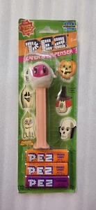 PEZ Mummy - Glow in the Dark 2002 - Peach stem MOC - Picture 1 of 2