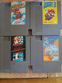 Nintendo NES Game Lot: Super Mario Bros. 2, 3, Duck Hunt, Adventures of Lolo