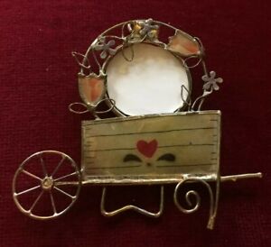 Gold wired chic wheelbarrow and floral entwined photo frame