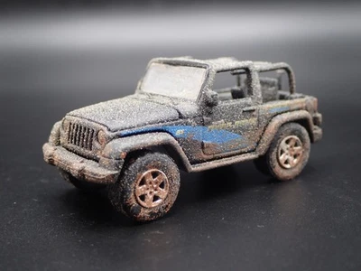 2012 12 JEEP WRANGLER GENEVA IL POLICE DEPT MUDDY 1/64 SCALE DIECAST MODEL CAR - Image 1 of 4