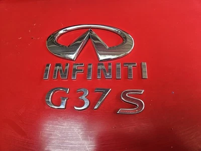 ☄️ INFINITI G37S G37 S COUPE 2 DOOR Rear Trunk Lid Emblem BADGE LOGO OEM - image 1 of 3