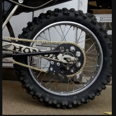 Honda Rear Sprocket Chain Guard XR80R XR100R CRF80F CRF100F(85-13) 52156-GN1-000 - Image 1 of 3