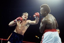 Gerrie Coetzee Throws A Left Punch Against Michael Dokes 1 Old Boxing Photo