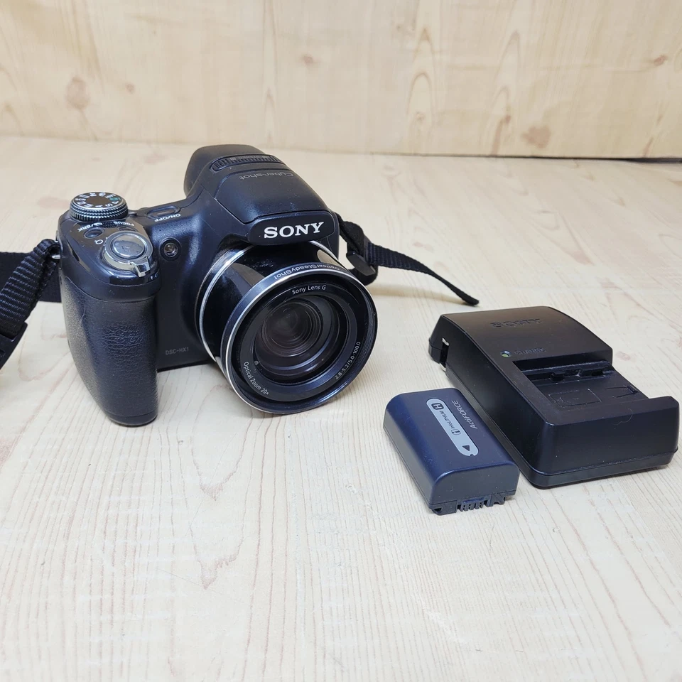 Cámara digital Sony Cyber-shot DSC-HX1 zoom 9,1 MP 20x FUNCIONA PUERTA FALTANTE COMO ESTÁ Foto 1 de 4