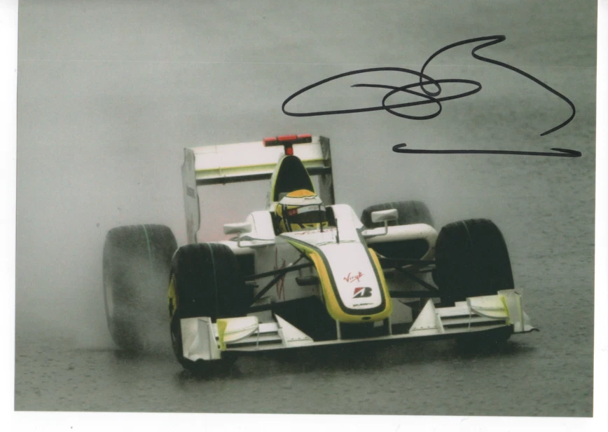 Jenson Button signed photo Brawn GP F1 Team 2009.  GP Winner COA. - Image 1 of 2