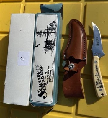 Cuchillo de caza vintage Schrade Scrimshaw Moose 502SC EE. UU. funda de cuero desollador Foto 1 de 4