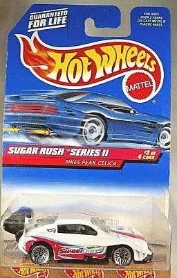 Hot Wheels #971 Sugar Rush Series II 1999-Sweet Tarts 3/4 Pikes Peak Celica blanco Foto 1 de 4