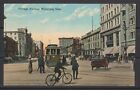 Années 1910 Canada ~ Winnipeg, Man. ~ Avenue Portage ~ Cycliste à l'intersection occupée