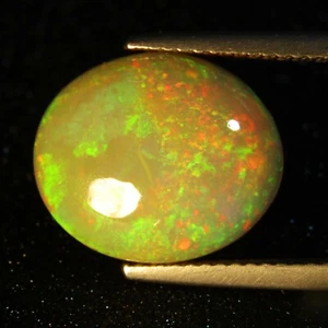5.37Cts Natural Color Play Unheated Ethiopia White Opal Oval Gemstone Ref--VIDEO - Picture 1 of 4