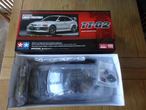 TAMIYA MITSUBISHI LANCER EVOLUTION V NEW IN BOX KIT COMPLETE WITH ESC - Picture 1 of 10