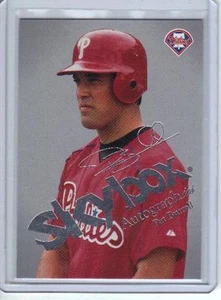 2004-  SKYBOX AUTOGRAPHICS  #10- Pat Burrell  (INSIGNIA)  Pr: 007/150 - Picture 1 of 2