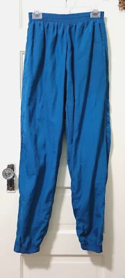 Pantalones deportivos Reebok Jogger vintage para mujer M verde azulado brillante forrados con cremallera puño pierna Foto 1 de 4