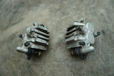 06 KAWASAKI VULCAN NOMADVN 1600 FRONT BRAKE CALIPERS E-5549 - Изображение 1 из 4