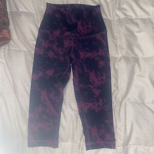 lululemon  Capri leggings Size 2 Black And Hot Pink Full Length Is 24 Inches.VG