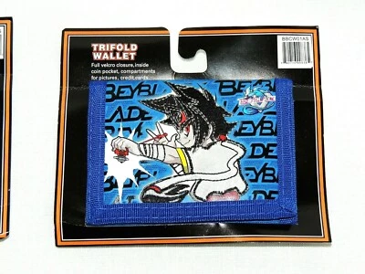 BEY BLADE~~ 1 CARTERA TRIPLE AZUL 4 1/2" X 3 1/4" CERRADA COMO SE MUESTRA Foto 1 de 2
