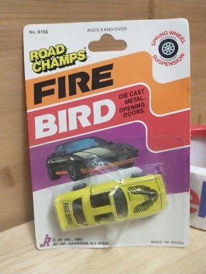 Road Champs diecast 1/64 Yellow Pontiac Fire Bird 1982 doors open new in package - Image 1 of 4