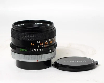 Lente Canon FD 28 mm 1:3,5 S.C lente principal gran angular 35 mm SLR película DSLR digital Foto 1 de 3
