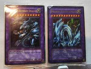 YuGiOh Drachenmeisterritter UF02-DE001 Blue Eyes Ultimate Dragon JMP-EN005 Ultra - Bild 1 von 2