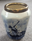 Delft blue and white pot with windmill