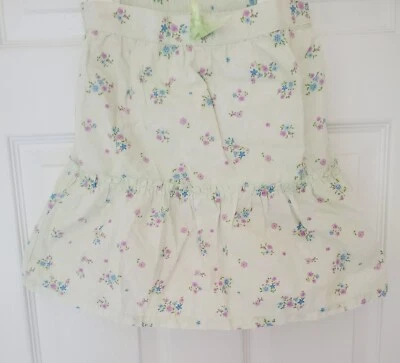 FALDA FLORAL VERDE CLARO 100% ALGODÓN CARTER'S BEBÉ NIÑA TALLA 6M  Foto 1 de 4