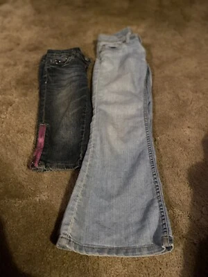 2 PARES de jeans y pantalones cortos para niñas pequeñas... seminuevos... marcas mixtas... talla 7 Foto 1 de 4