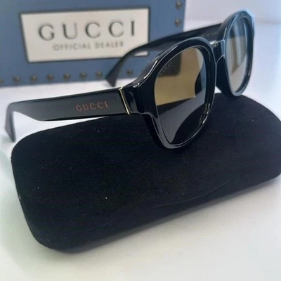 GAFAS DE SOL GUCCI GG1140SK-003 UNISEX CLÁSICAS DE DISEÑO EN NEGRO Y DORADO/MARRÓN 54 MM Foto 1 de 4