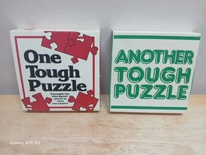 One Tough Puzzle 1989 & Another Tough Puzzle 1988 Great American Puzzle Factory - Picture 1 of 4