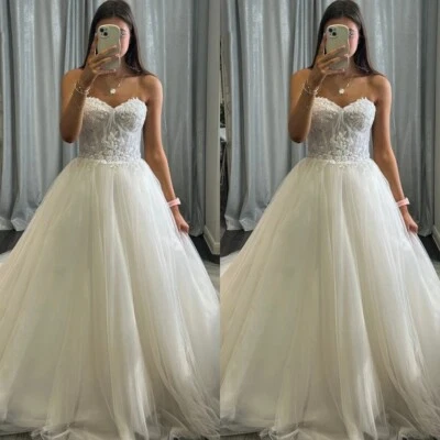 Vestidos de novia boho de playa sin mangas elegantes con hombros descubiertos Foto 1 de 4