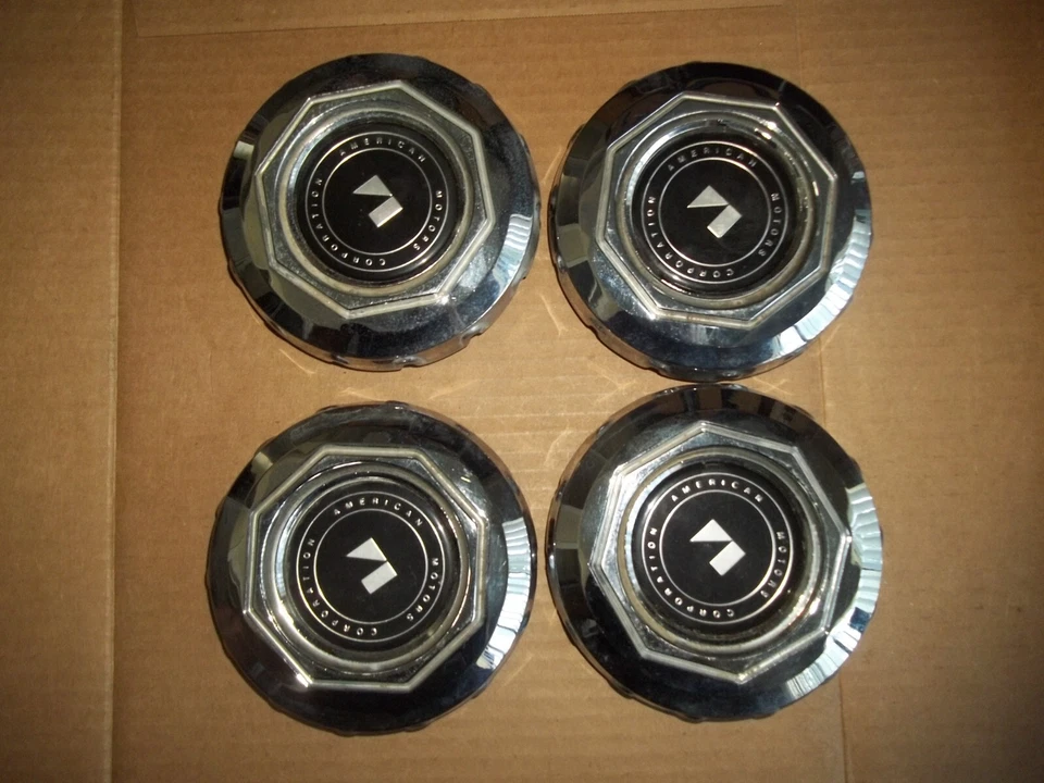 81 82 83 AMC Concord Spirit Tapacubos Llanta Cubierta Tapacubos Emblema Central CABLE 4 Foto 1 de 4