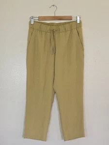 Lululemon On the Fly Crop Pant Womens Size 6 Woven Vintage Gold Mustard Color - Picture 1 of 10