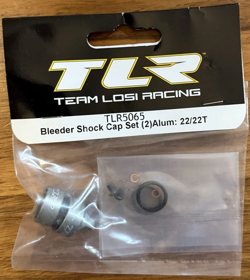 Team Losi Racing 5065 Bleeder Shock Cap Set (2) (TLR 22/22T) - Image 1 of 1