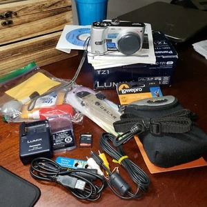 Panasonic Lumix DMC-TZ1 Digital Camera Battery Charger, Case, GB Card, tripod... - Picture 1 of 1