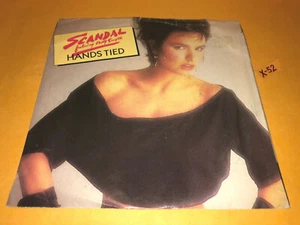 Scandal featuring Patty Smyth Hands Tied 7in vinyl hit single record (Warrior) - Imagen 1 de 5