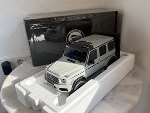 Casi Real Mercedes AMG G 63 4x4 alto 2 2023 Arabian Grey 1:18 embalaje original - Imagen 1 de 24