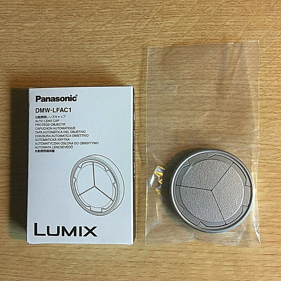 Panasonic Lumix DMW-LFAC1 Silver automatic lens cap for LX100 - Image 1 of 2