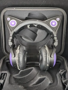 Brookstone Cuffie Cablate Orecchio di Gatto con Custodia Mic, Viola Funzionante  - Foto 1 di 12