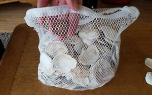 1.8 Kg Native Oyster shell smalls/cut in zipped nylon 3x2mm mesh bag pond media