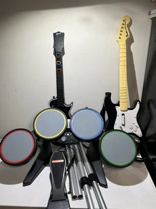 Xbox 360 Rock Band Drums w/ Guitars, Pedal. See Pictures. Sold As Is - Picture 1 of 13