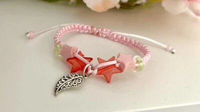 Geknüpftes Armband mit Anhänger Rosa - Bild 1 von 2