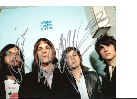 KINGS OF LEON AUTOGRAPH 8x10 PHOTO SIGNED BY ALL 4 MEMBERS Cover