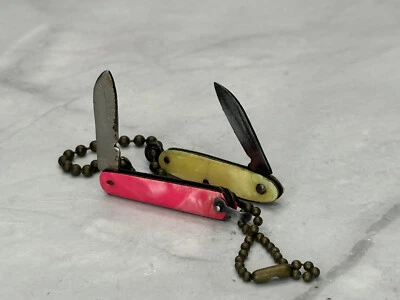 Lote de 2 mini cuchillos de bolsillo vintage de celuloide perla amarilla y rosa (Japón) Foto 1 de 4