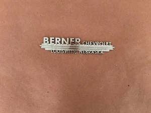 VINTAGE DEALER EMBLEM BERNER CHEVROLET LOUISVILLE NE CHEVELLE CAMARO 396 NOVA - Picture 1 of 2