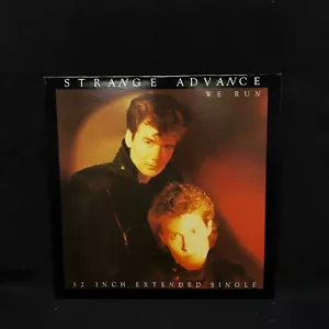 Strange Advance - We Run ( 12" Remix Vinyl Record ) - Bild 1 von 4