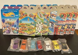 McDonald’s Hot Wheels 1991 - 7 Diff Autos mit Boxen. Alles Neu - MISP - Bild 1 von 2